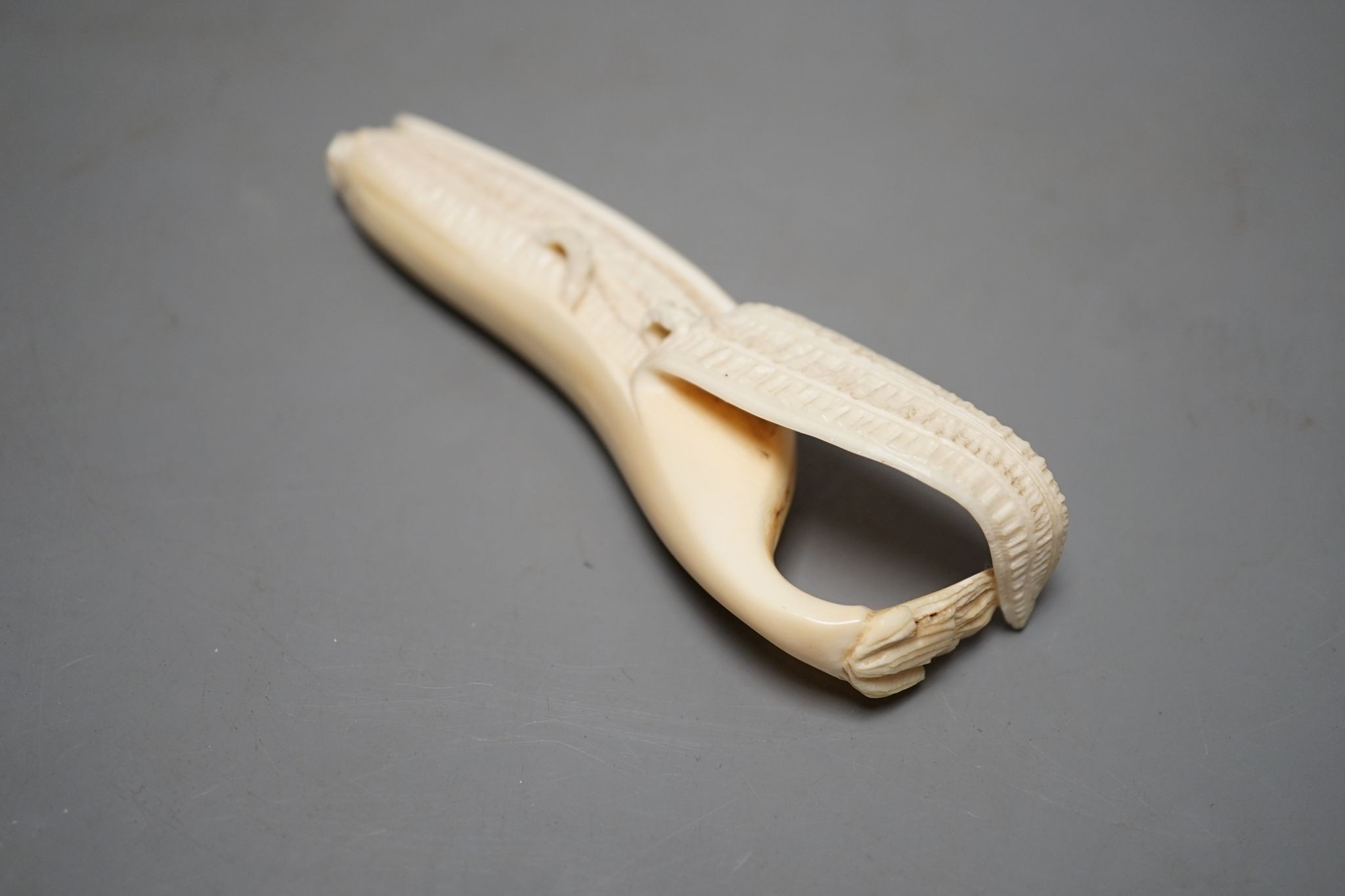 A Japanese ivory model of a banana, Meiji period 12cm